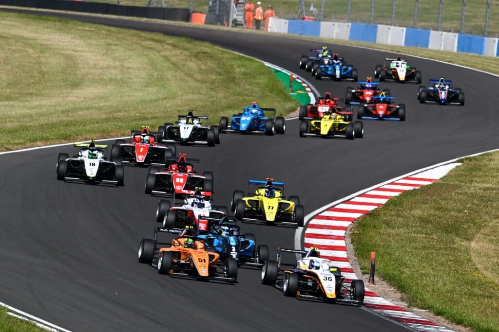 Close quarters action at GB4 Championship at Donington Park